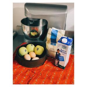 a counter with a bowl of eggs and a food processor at Garni Enrosadira in Vigo di Fassa