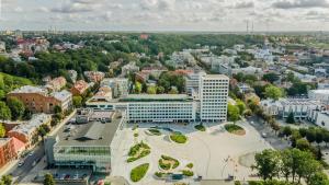 an aerial view of a city with a building at River city apartments No 5 by URBAN RENT in Kaunas