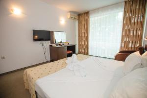 Postel nebo postele na pokoji v ubytování Deva Hotel - All Inclusive