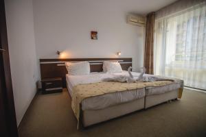 Postel nebo postele na pokoji v ubytování Deva Hotel - All Inclusive