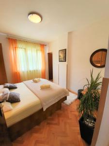 a bedroom with a large bed in a room at Apartments Angela in Kampor +103 photos