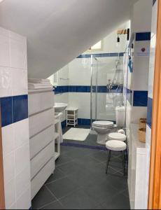 Kúpeľňa v ubytovaní SUITE ISOLA BELLA