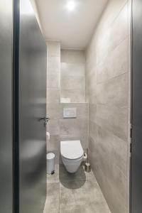 Koupelna v ubytování TIMEOUT City Hotel