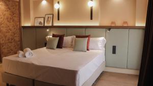Postel nebo postele na pokoji v ubytování JovA Hotel Boutique