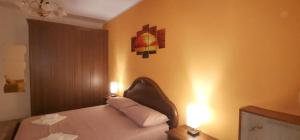 Posteľ alebo postele v izbe v ubytovaní B&B La Terrazza