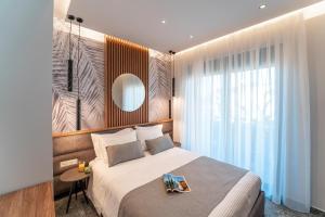 Imagen de la galería de Palmeral Luxury Suites, en Rodas