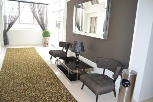 Posezení v ubytování LimaQ Hotel