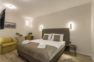 Postel nebo postele na pokoji v ubytování COR ROOMS