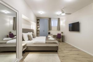 TV a/nebo společenská místnost v ubytování COR ROOMS