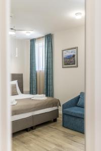 Postel nebo postele na pokoji v ubytování COR ROOMS