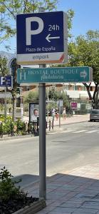 a street sign on the side of a street at Hotel Boutique Andalucia in Fuengirola