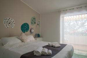 Кровать или кровати в номере Hotel Punto Verde