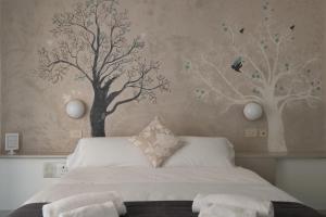 Кровать или кровати в номере Hotel Punto Verde