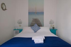 Кровать или кровати в номере Hotel Punto Verde