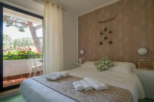 Кровать или кровати в номере Hotel Punto Verde