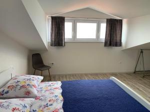 Postel nebo postele na pokoji v ubytování Apartments Nevenka i Josko