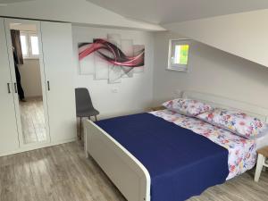Postel nebo postele na pokoji v ubytování Apartments Nevenka i Josko