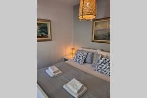 Posteľ alebo postele v izbe v ubytovaní Studio Apartment Marella