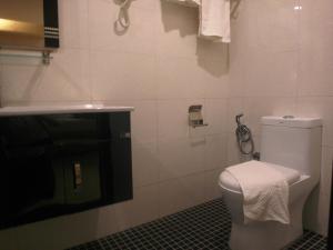 Baðherbergi á Mandarin Hotel Kota Kinabalu
