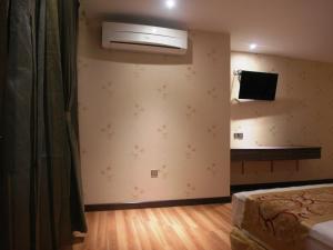 Sjónvarps- og/eða afþreyingartæki á Mandarin Hotel Kota Kinabalu