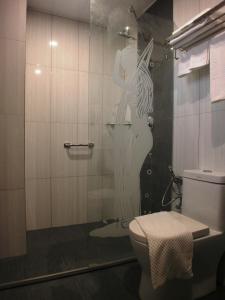 Baðherbergi á Mandarin Hotel Kota Kinabalu