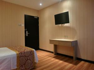 Sjónvarps- og/eða afþreyingartæki á Mandarin Hotel Kota Kinabalu