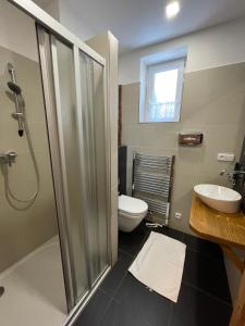 Koupelna v ubytování Hotel Kristian