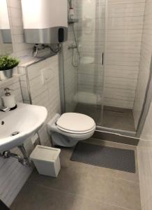Kúpeľňa v ubytovaní Millenove Apartman Balatonföldvár