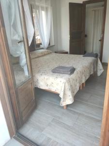 Postel nebo postele na pokoji v ubytování Locanda mami