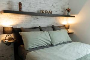 Säng eller sängar i ett rum på 051 Guest House Sant'Orsola Malpighi