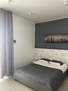 Postel nebo postele na pokoji v ubytování Zigzag