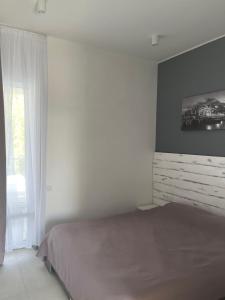 Postel nebo postele na pokoji v ubytování Zigzag