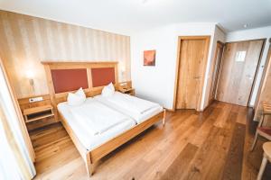 Postel nebo postele na pokoji v ubytování Hotel & Gasthof Löwen