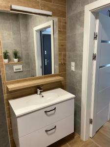 Kúpeľňa v ubytovaní Gąski Apartament Nadmorski + 12 fotografií