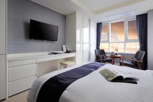 Postel nebo postele na pokoji v ubytování Ever8 Serviced Residence