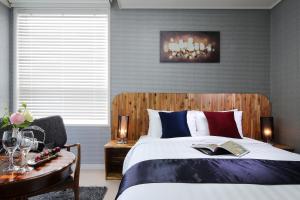 Postel nebo postele na pokoji v ubytování Ever8 Serviced Residence