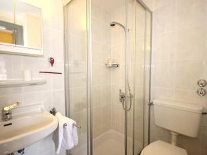 A bathroom at Apartment Am Birkenhain-8 by Interhome