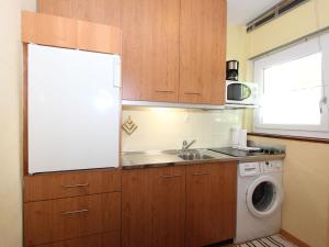 A kitchen or kitchenette at Apartment Am Birkenhain-8 by Interhome