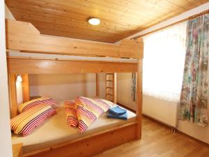 Postel nebo postele na pokoji v ubytování Apartment Zillertalblick by Interhome