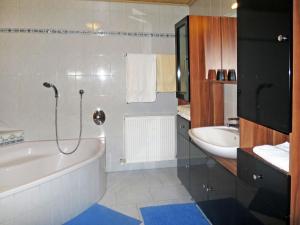 Bathroom sa Apartment Bauernhof Gasteg - PID231 by Interhome