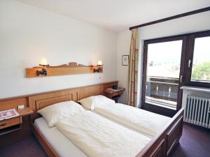 Ein Bett oder Betten in einem Zimmer der Unterkunft Apartment Excelsior by Interhome