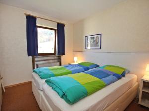 Postel nebo postele na pokoji v ubytování Chalet Amberg by Interhome