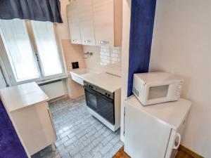 Kuchyň nebo kuchyňský kout v ubytování Apartment La Busa-2 by Interhome + 14 fotografií