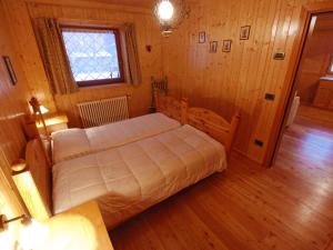 Postel nebo postele na pokoji v ubytování Apartment Cesa Galaldriel-2 by Interhome