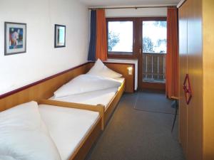 Posteľ alebo postele v izbe v ubytovaní Apartment Sonne-3 by Interhome