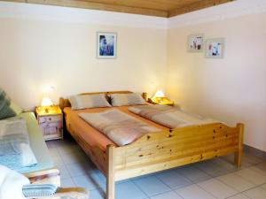 Ένα ή περισσότερα κρεβάτια σε δωμάτιο στο Holiday Home Berghaus by Interhome