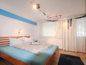 Katil atau katil-katil dalam bilik di Apartment Dias by Interhome