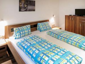 Posteľ alebo postele v izbe v ubytovaní Apartment Gitti by Interhome
