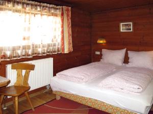 Posteľ alebo postele v izbe v ubytovaní Holiday Home Hexenhäusl by Interhome