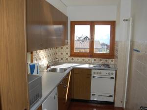 Kuchyň nebo kuchyňský kout v ubytování Apartment Christiania I F4 by Interhome